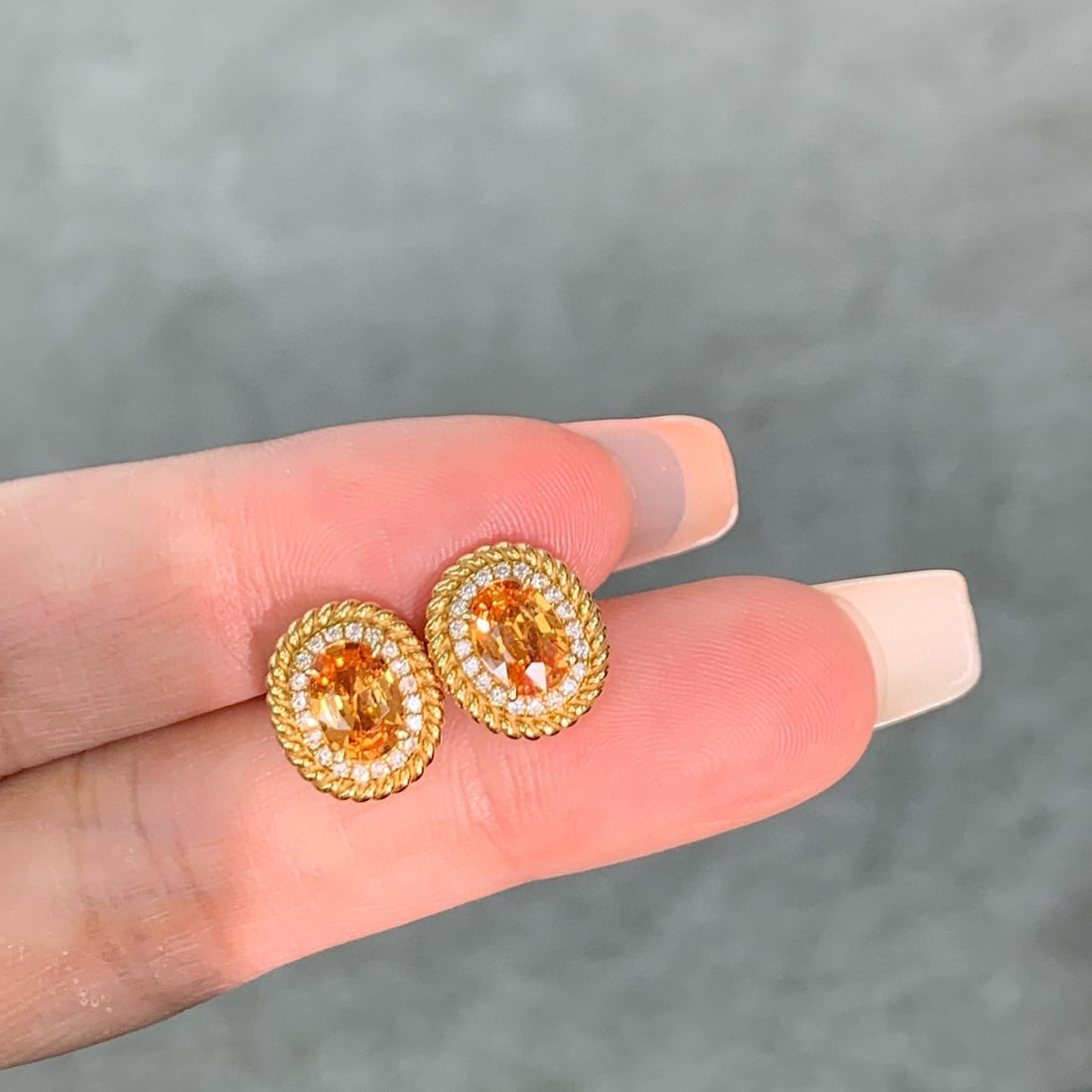 14k Gold 1.86 Ct Natural Spessartine & Diamond Earrings: Ref:231054438 // gold content:14k gold // main gemstone:spessartine // shape:oval // carat weight:1. 86ct // color:orange // treatment:natural // // adjacent gemstone 2 : diamond // shape:round //