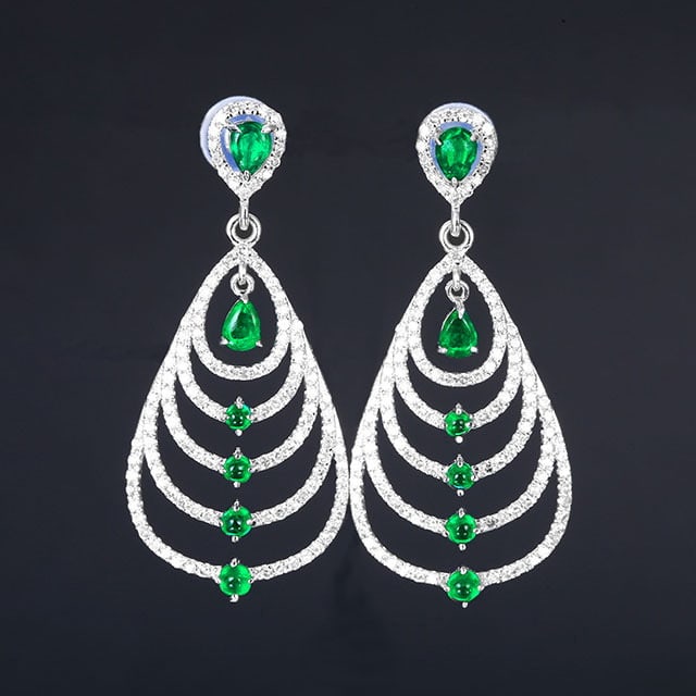 14k Gold 1.56 Ctw Natural Emerald & Diamond Earrings: Ref:231055001 // gold content:14k gold // main gemstone:emerald // shape:multiply // carat weight:0. 85ct // color:green // treatment:natural // // adjacent gemstone 2 : diamond // number of