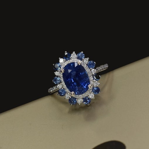 14k Gold 2.48 Ctw Natural Sapphire & Diamond Ring: Ref:231055006 // gold content:14k gold // ring size:7. 25us // // main gemstone:sapphire // shape:oval // carat weight:2. 19ct // color:blue // treatment:natural // // adjacent gemstone 2 : diamond //