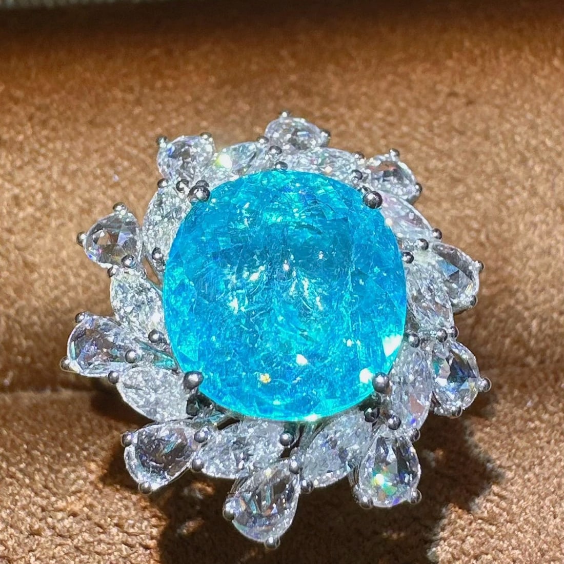 14k Gold 4.03 Ctw Natural Paraiba Tourmaline & Diamond Ring: Ref:231055016 // gold content:14k gold // ring size:7. 25us // // main gemstone:paraiba tourmaline // shape:oval // carat weight:2. 88ct // color:blue // treatment:natural // // adjacent gemstone 2 : 
