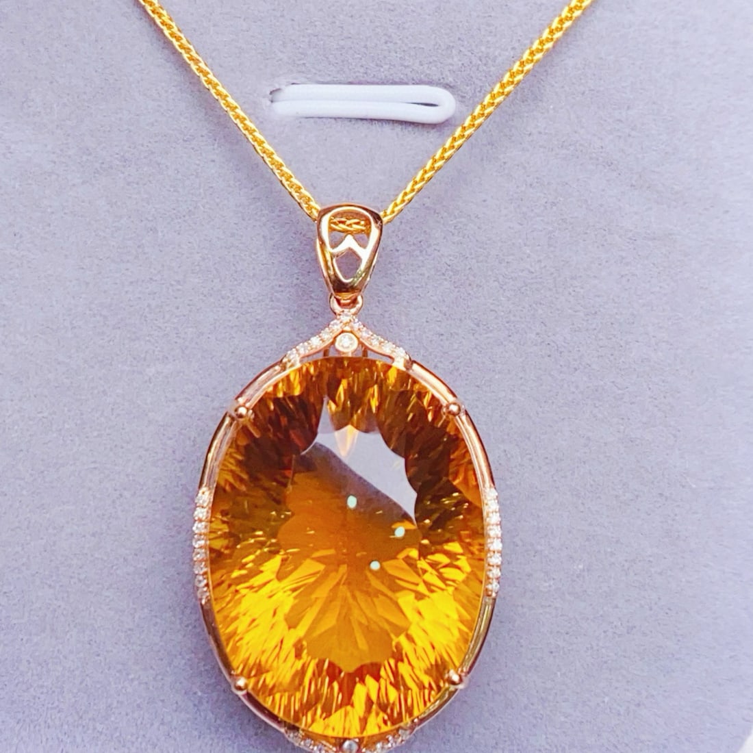 14k Gold 39.52 Ctw Natural Citrine & Diamond Pendant( Without Chain ): Ref:231055020 // gold content:14k gold // main gemstone:citrine // shape:oval // carat weight:39. 4ct // color:yellow // treatment:natural // // adjacent gemstone 2 : diamond // number of stones:40 //