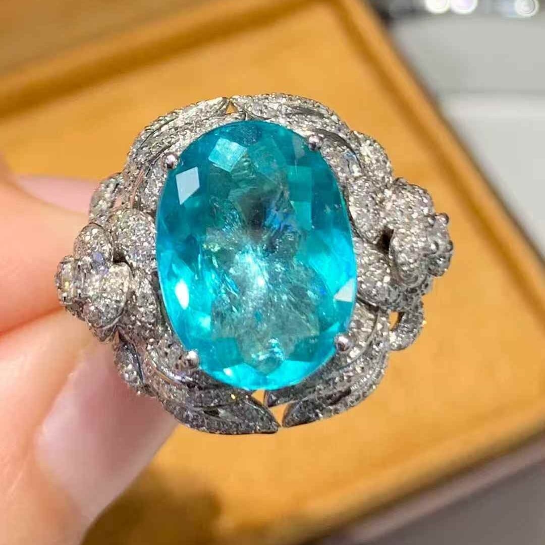 14k Gold 5 Ct Natural Paraiba Tourmaline & Diamond Ring: Ref:231055047 // gold content:14k gold // ring size:7. 25us // // main gemstone:paraiba tourmaline // shape:oval // carat weight:5ct // color:blue // treatment:natural // // adjacent gemstone 2 :