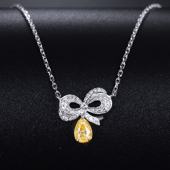 14k Gold 0.21 Ctw Natural Yellow Diamond & Diamond Necklace: Ref:231055108 // gold content:14k gold // main gemstone:yellow diamond // shape:pear // carat weight:0. 13ct // color:yellow // treatment:natural // // adjacent gemstone 2 : diamond // shape:round //