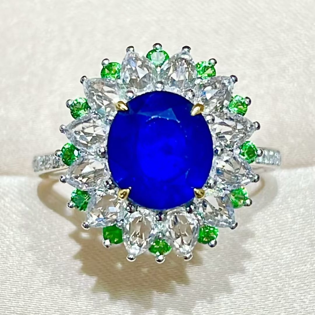 14k Gold 2.48 Ct Natural Sapphire & Diamond & Sapphire & Tsavorite Ring: Ref:231055142 // gold content:14k gold // ring size:7. 25us // // main gemstone:sapphire // shape:oval // carat weight:2. 48ct // color:royal blue // treatment:natural // // adjacent gemstone 2 :
