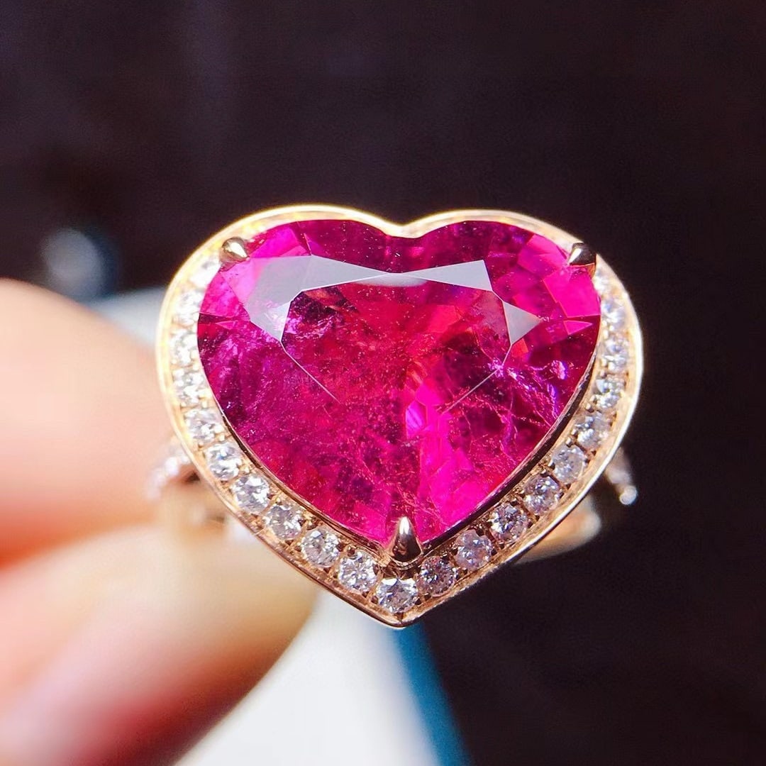 14k Gold 7.75 Ctw Natural Tourmaline & Diamond Ring: Ref:231055162 // gold content:14k gold // ring size:7. 25us // // main gemstone:tourmaline // shape:heart // carat weight:7. 23ct // color:red // treatment:natural // // adjacent gemstone 2 : diamond