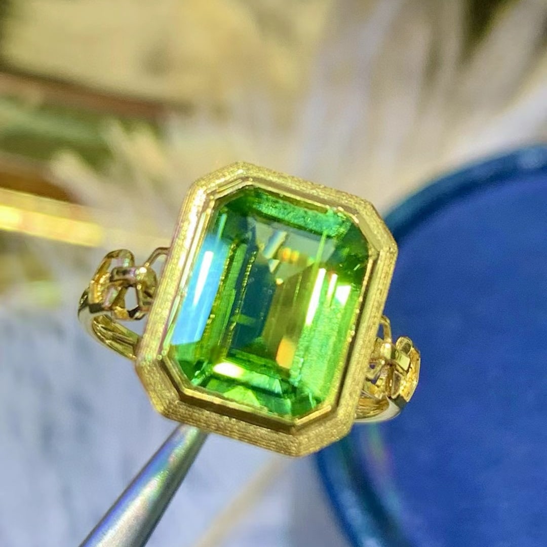 14k Gold 4.1 Ct Natural Tourmaline Ring: Ref:231055167 // gold content:14k gold // ring size:7. 25us // // main gemstone:tourmaline // shape:octagonal // carat weight:4. 1ct // color:green // treatment:natural // Condition: New Low Estimate: