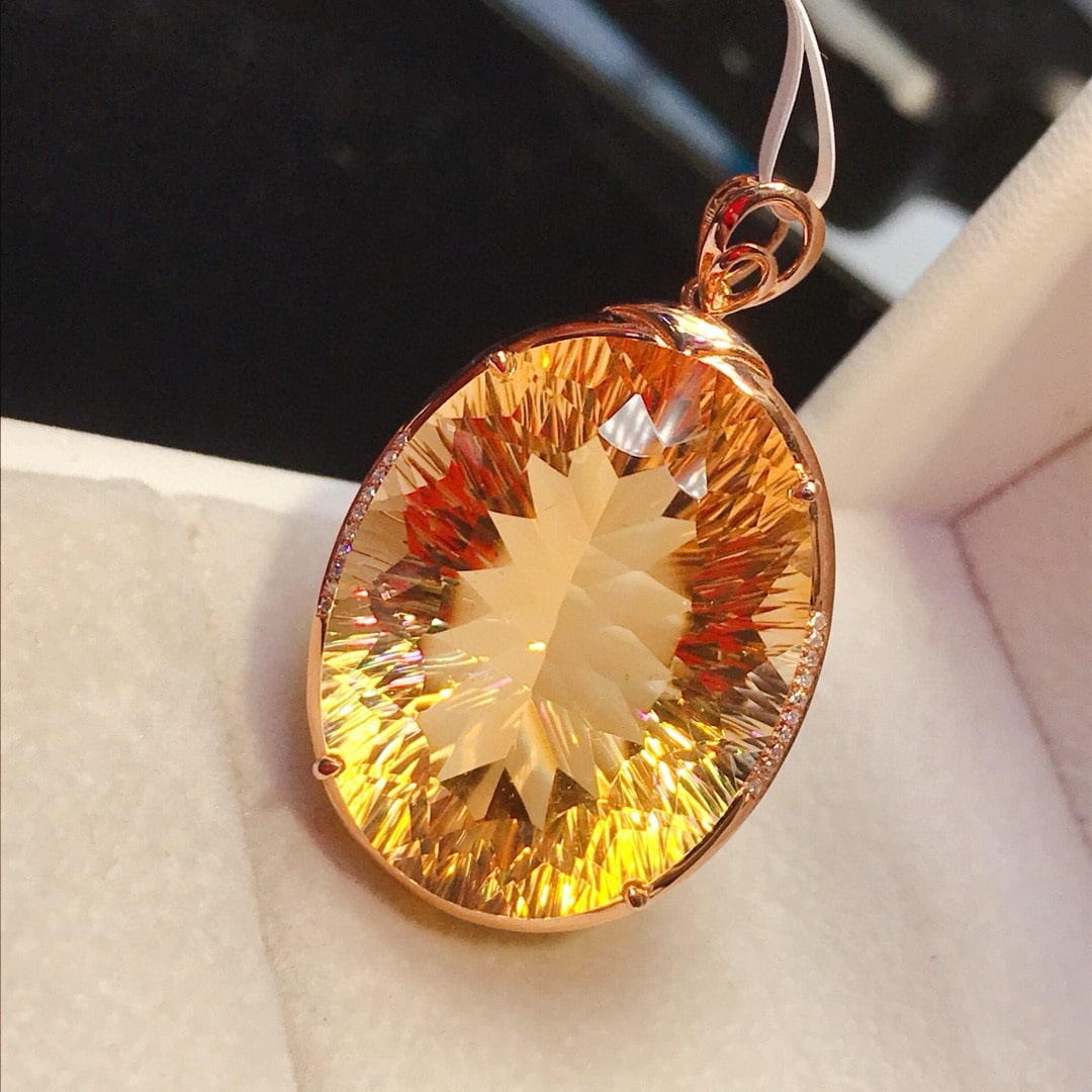 14k Gold 47.35 Ct Natural Citrine & Diamond Pendant( Without Chain ): Ref:231055173 // gold content:14k gold // main gemstone:citrine // shape:oval // carat weight:47. 35ct // color:yellow // treatment:natural // // adjacent gemstone 2 : diamond // number of stones:20