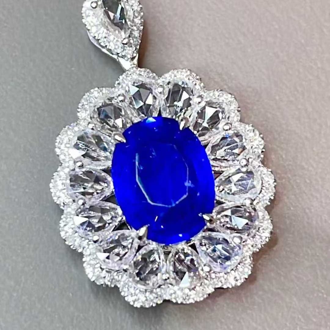 14k Gold 1.92 Ct Natural Sapphire & Diamond & Sapphire Pendant( Without Chain ): Ref:231055182 // gold content:14k gold // main gemstone:sapphire // shape:oval // carat weight:1. 92ct // color:royal blue // treatment:natural // // adjacent gemstone 2 : diamond // shape:round //
