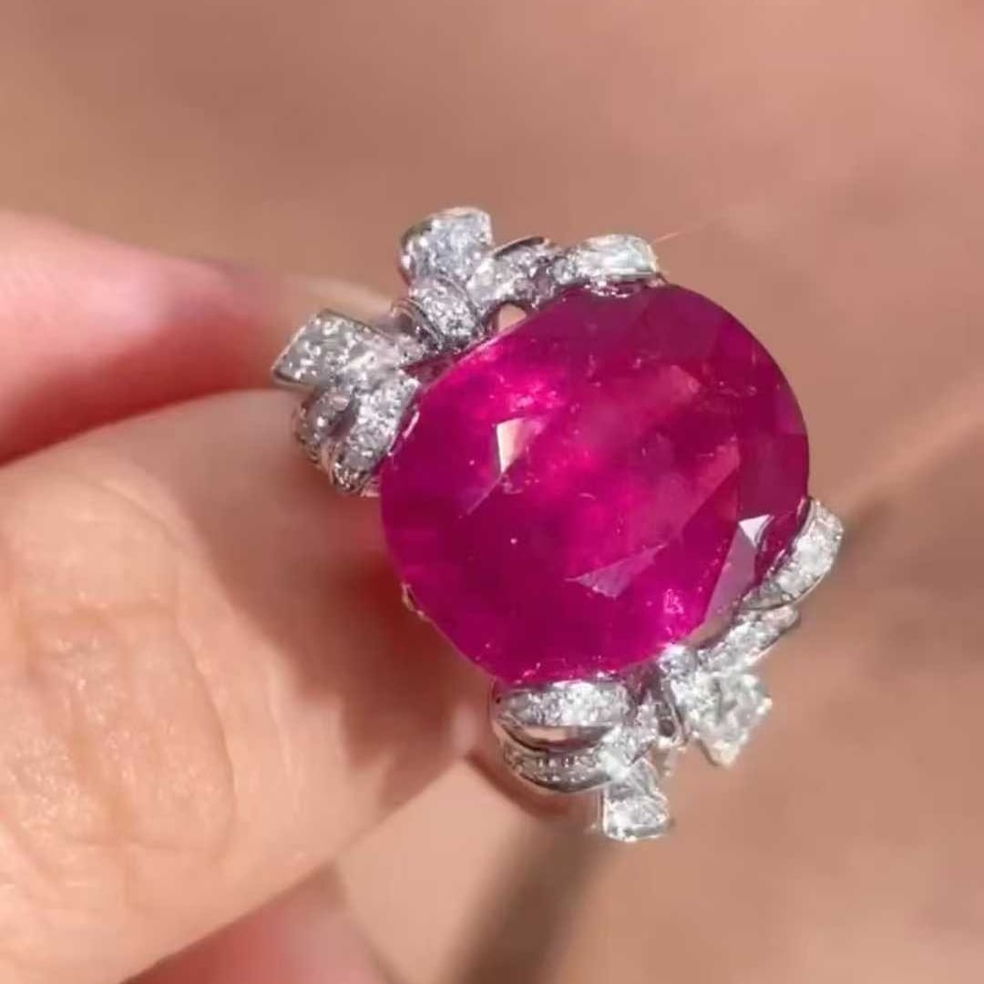 14k Gold 7.6 Ct Natural Tourmaline & Diamond Ring: Ref:231055251 // gold content:14k gold // ring size:7. 25us // // main gemstone:tourmaline // shape:oval // carat weight:7. 6ct // color:red // treatment:natural // // adjacent gemstone 2 : diamond //