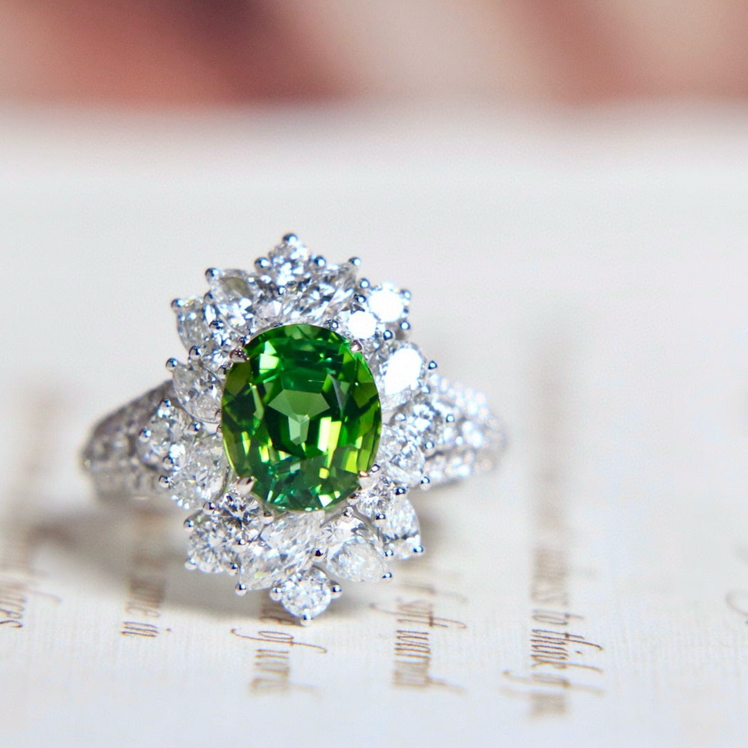 14k Gold 5.39 Ctw Natural Tourmaline & Diamond Ring: Ref:231056073 // gold content:14k gold // ring size:7. 25us // // main gemstone:tourmaline // shape:oval // carat weight:3. 4ct // color:green // treatment:natural // // adjacent gemstone 2 : diamond