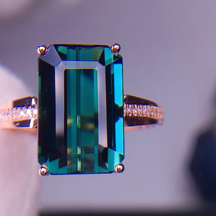 14k Gold 5.96 Ct Natural Tourmaline & Diamond Ring: Ref:231056123 // gold content:14k gold // ring size:7. 25us // // main gemstone:tourmaline // shape:octagonal // carat weight:5. 96ct // color:bluish green // treatment:natural // // adjacent gemstone