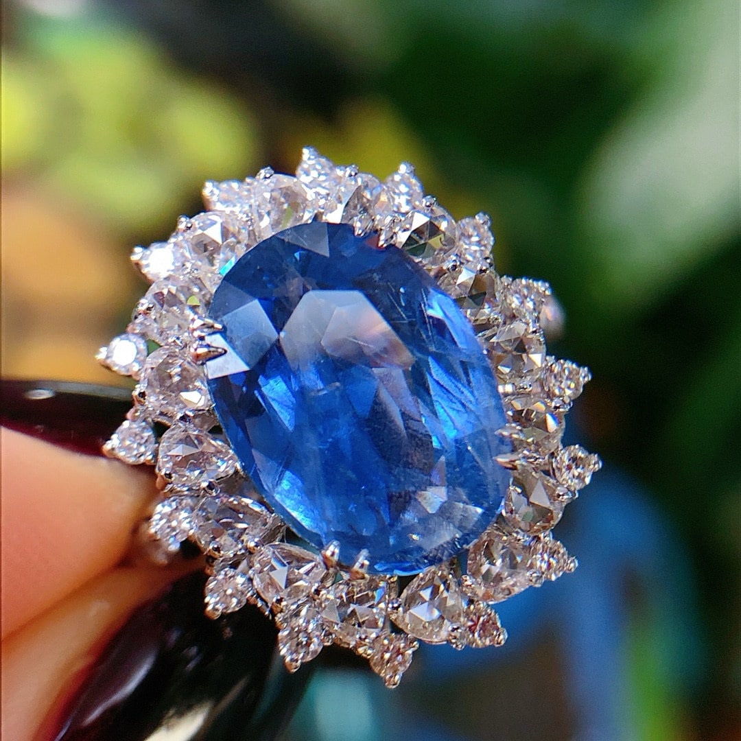 14k Gold 5.47 Ctw Natural Sapphire & Diamond Ring: Ref:231056125 // gold content:14k gold // ring size:7. 25us // // main gemstone:sapphire // shape:oval // carat weight:4. 27ct // color:blue // treatment:natural // // adjacent gemstone 2 : diamond //