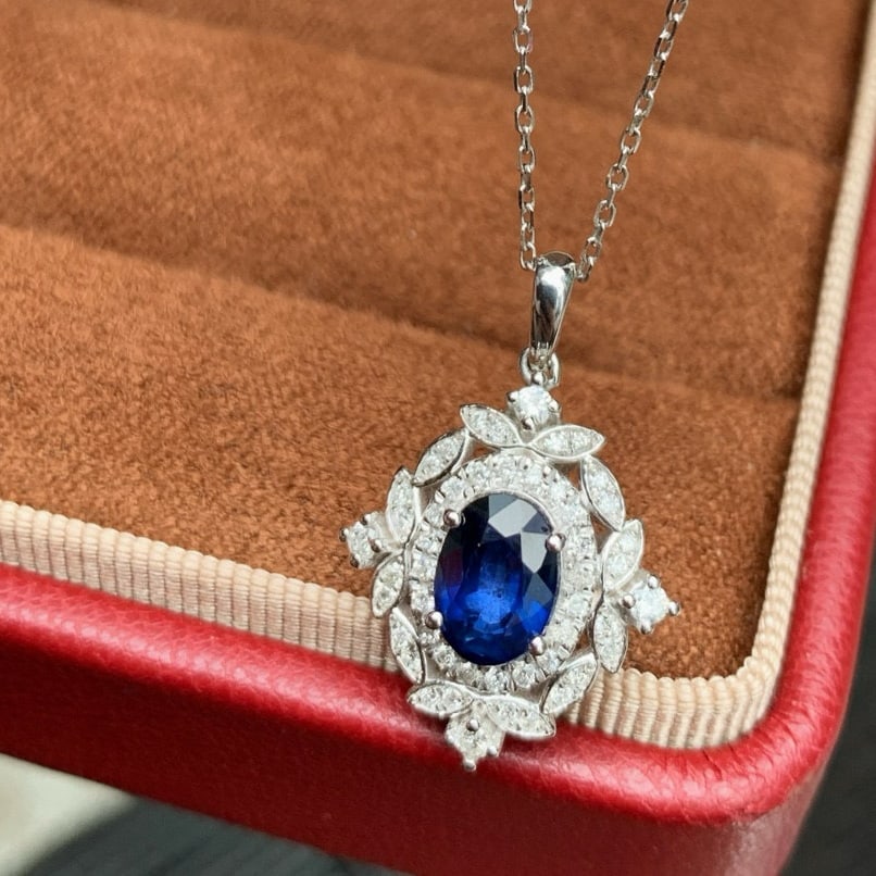 14k Gold 1.65 Ctw Natural Sapphire & Diamond Pendant( Without Chain ): Ref:231056139 // gold content:14k gold // main gemstone:sapphire // shape:oval // carat weight:1. 35ct // color:royal blue // treatment:natural // // adjacent gemstone 2 : diamond // shape:round //