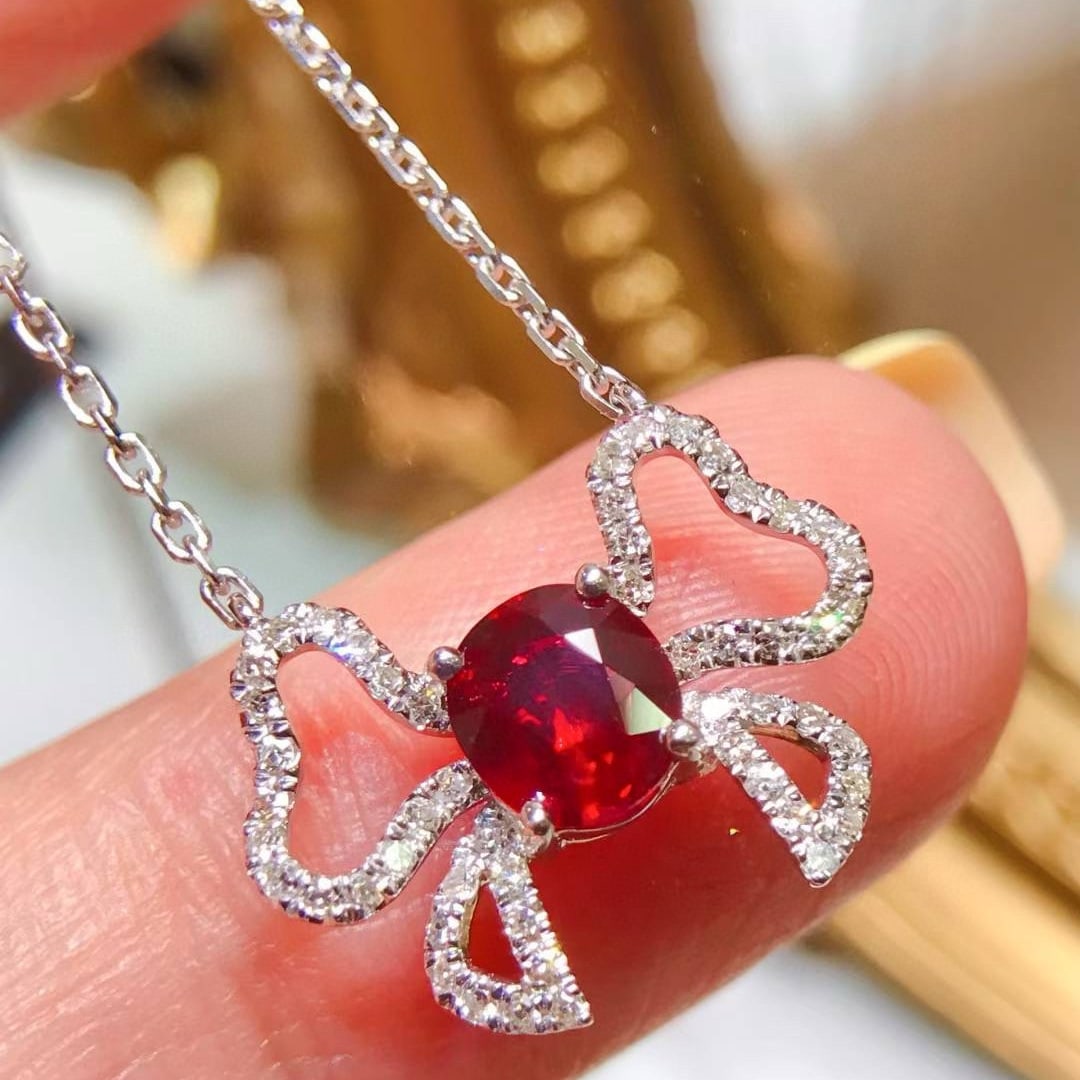 14k Gold 0.86 Ctw Natural Ruby & Diamond Necklace: Ref:231056141 // gold content:14k gold // main gemstone:ruby // shape:oval // carat weight:0. 65ct // color:pigeonblood red // treatment:natural // // adjacent gemstone 2 : diamond // shape:round //
