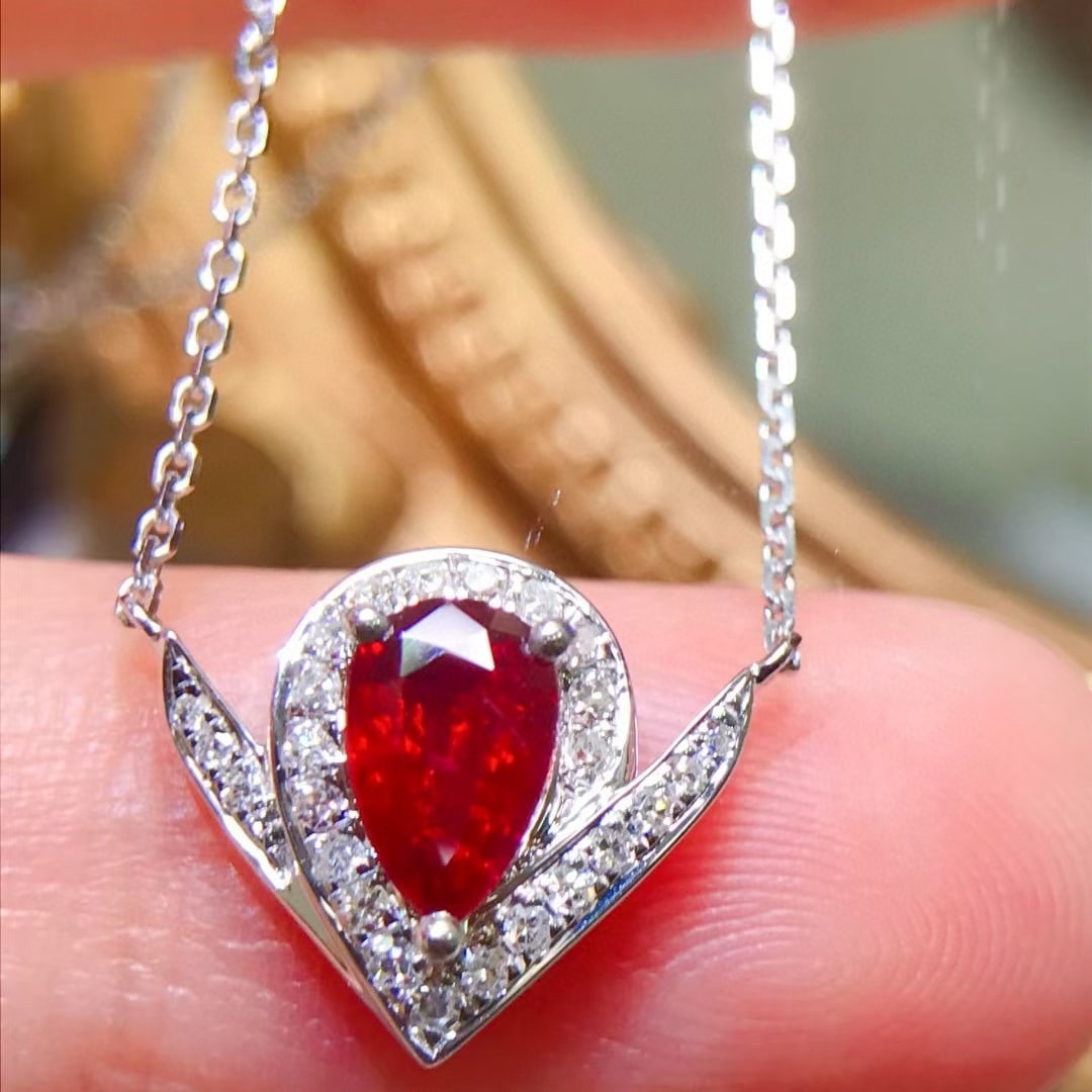 14k Gold 0.92 Ctw Natural Ruby & Diamond Necklace: Ref:231056165 // gold content:14k gold // main gemstone:ruby // shape:pear // carat weight:0. 75ct // color:pigeonblood red // treatment:natural // // adjacent gemstone 2 : diamond // shape:round //