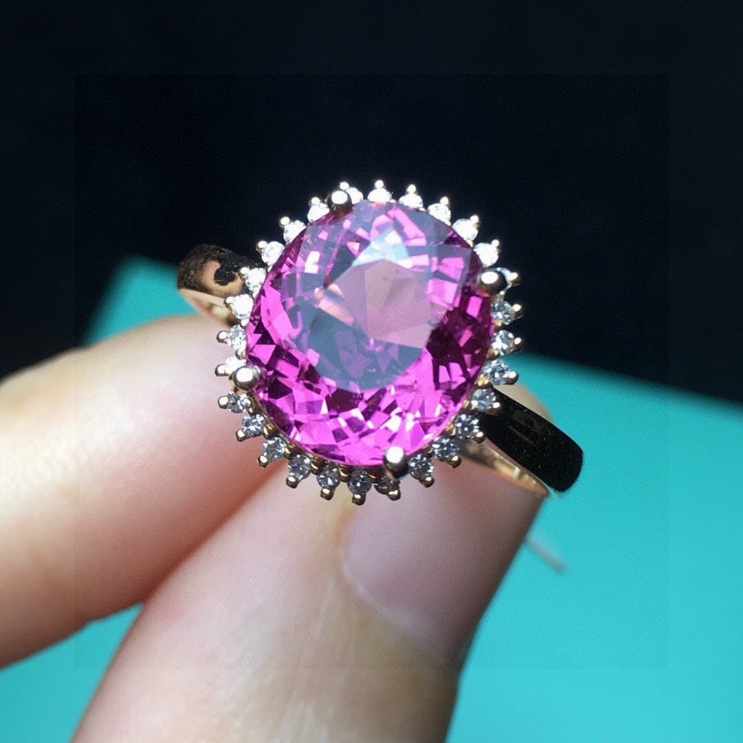 14k Gold 3.17 Ct Natural Tourmaline & Diamond Ring: Ref:231056188 // gold content:14k gold // ring size:7. 25us // // main gemstone:tourmaline // shape:oval // carat weight:3. 17ct // color:purplish red // treatment:natural // // adjacent gemstone 2 :