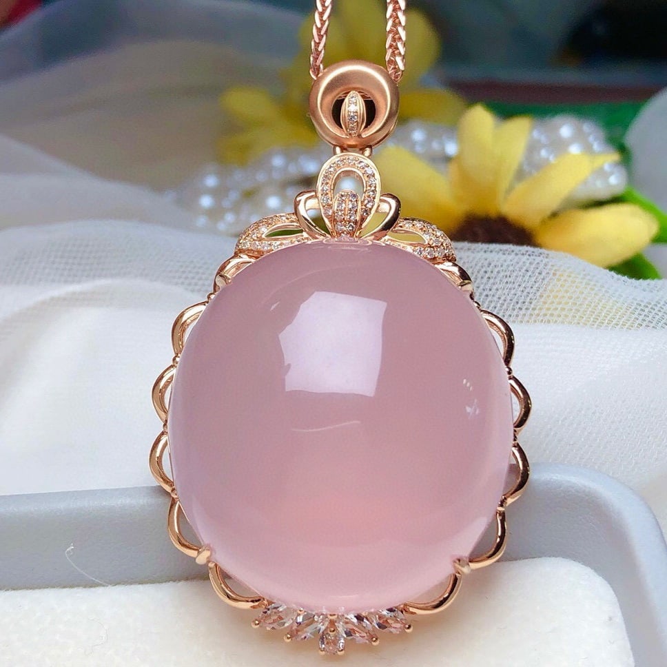 14k Gold 96.30 Ct Natural Rose Quartz & Diamond & Sapphire Pendant( Without Chain ): Ref:231056189 // gold content:14k gold // main gemstone:rose quartz // shape:oval // carat weight:96. 30ct // color:pink // treatment:natural // // adjacent gemstone 2 : diamond // number of stones:54