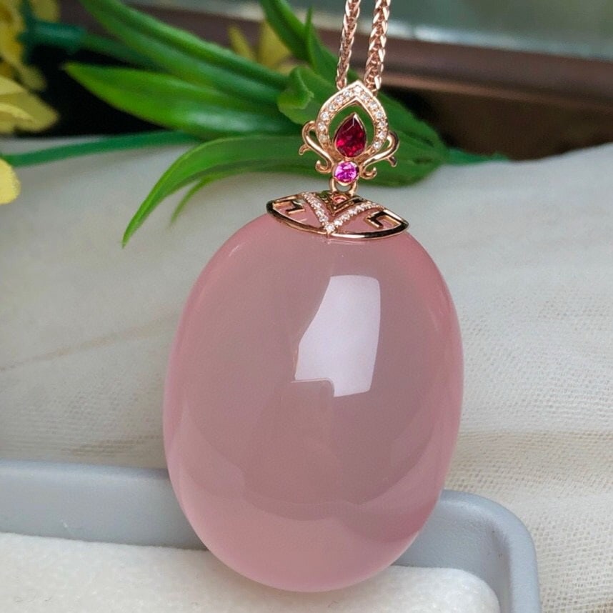 14k Gold 166 Ct Natural Rose Quartz & Diamond Pendant( Without Chain ): Ref:231056208 // gold content:14k gold // main gemstone:rose quartz // shape:oval // carat weight:166ct // color:pink // treatment:natural // // adjacent gemstone 2 : diamond // number of stones:30 //
