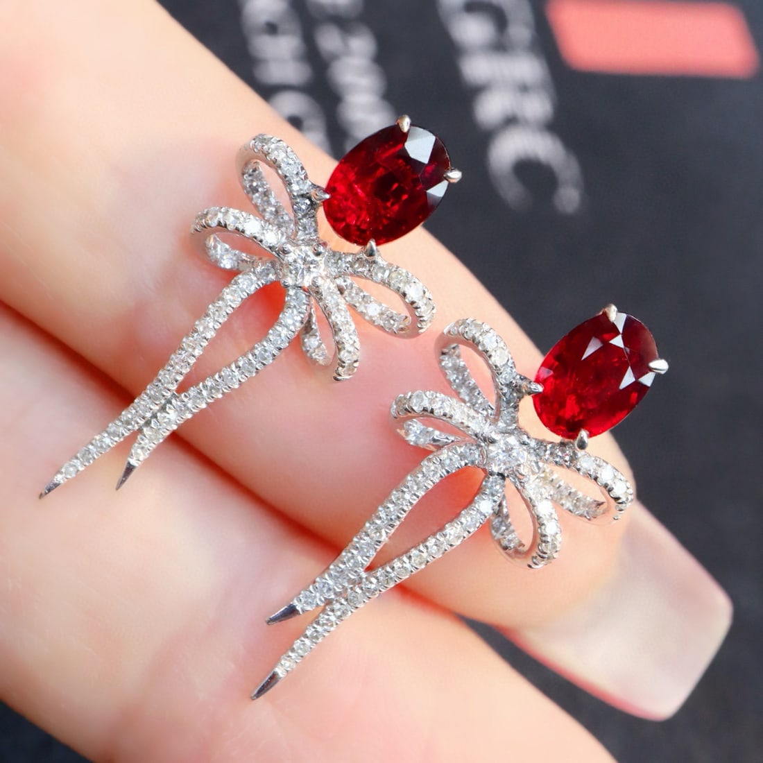14k Gold 1.59 Ctw Natural Ruby & Diamond Earrings: Ref:231056417 // gold content:14k gold // main gemstone:ruby // shape:oval // carat weight:1. 20ct // color:pigeonblood red // treatment:natural // // adjacent gemstone 2 : diamond // shape:round //