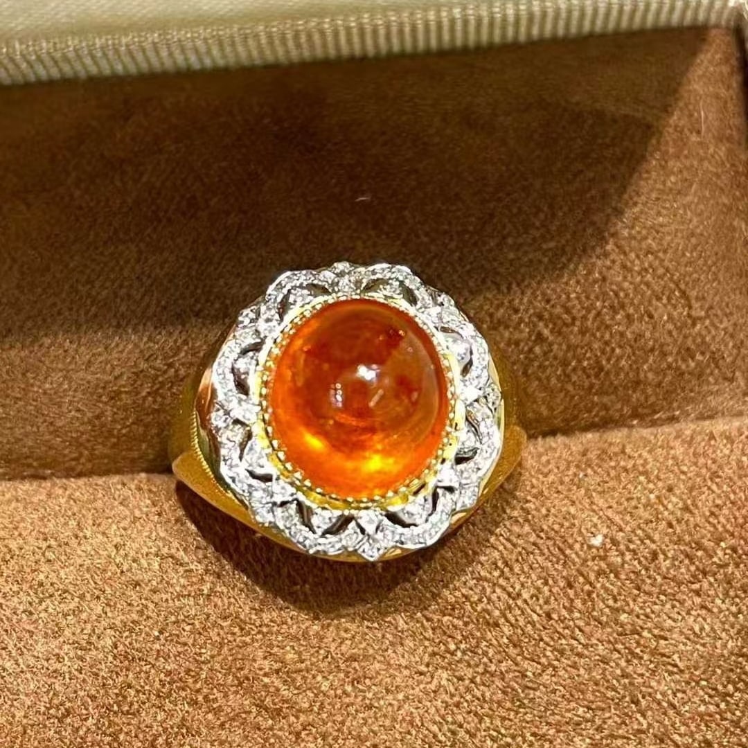 14k Gold 7.7 Ct Natural Spessartine & Diamond Ring: Ref:231057090 // gold content:14k gold // ring size:7. 25us // // main gemstone:spessartine // shape:oval // carat weight:7. 7ct // color:orange // treatment:natural // // adjacent gemstone 2 :