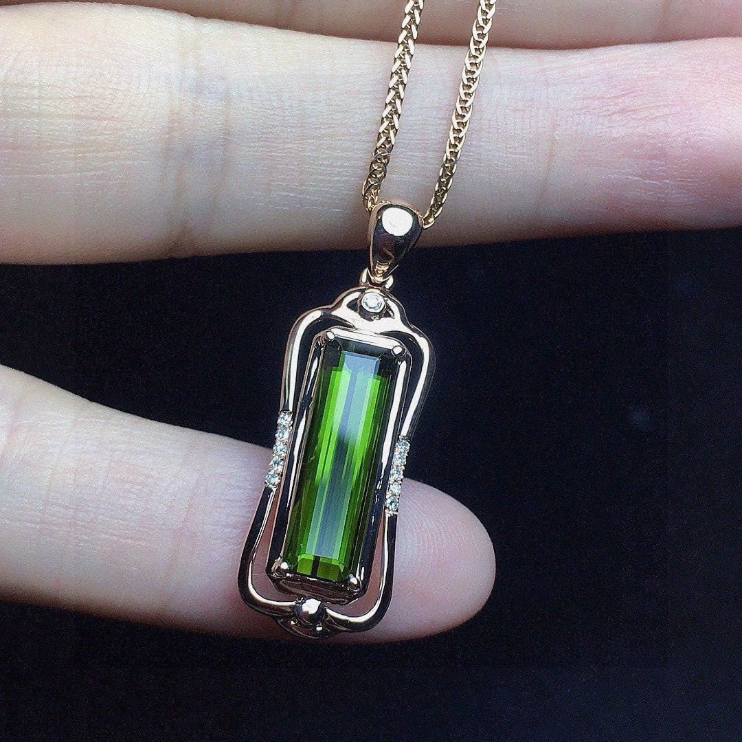 14k Gold 2.35 Ct Natural Tourmaline & Diamond Pendant( Without Chain ): Ref:231058206 // gold content:14k gold // main gemstone:tourmaline // shape:octagonal // carat weight:2. 35ct // color:green // treatment:natural // // adjacent gemstone 2 : diamond // number of