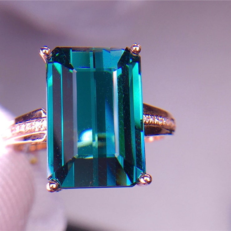 14k Gold 7 Ct Natural Tourmaline & Diamond Ring: Ref:231058263 // gold content:14k gold // ring size:7. 25us // // main gemstone:tourmaline // shape:octagonal // carat weight:7ct // color:bluish green // treatment:natural // // adjacent gemstone 2