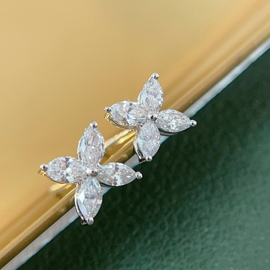14k Gold 0.34 Ct Natural H Diamond Earrings: Ref:231058265 // gold content:14k gold // main gemstone:diamond // shape:marquise // carat weight:0. 34ct // clarity grade:vs-si // color:h // treatment:natural // Condition: New Low Estimate: