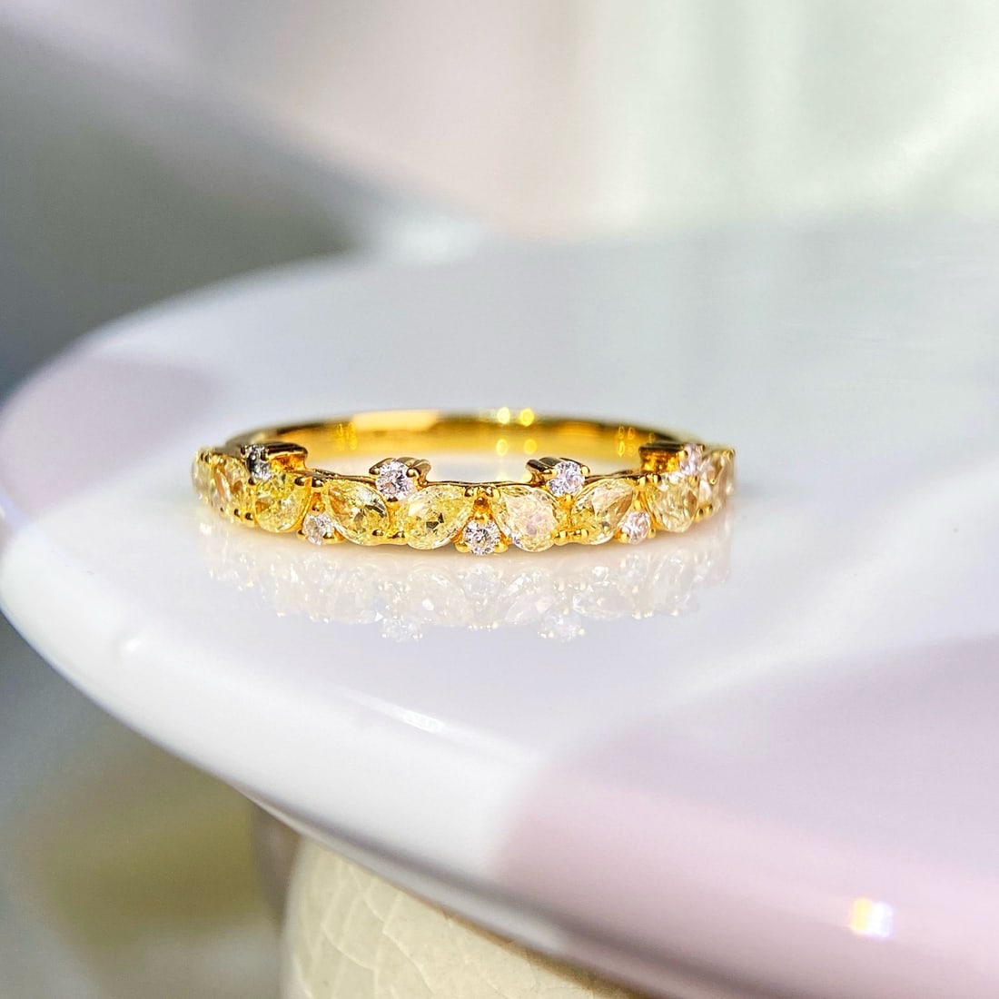 14k Gold 0.79 Ctw Natural Yellow Diamond & Diamond Ring: Ref:231058314 // gold content:14k gold // ring size:7. 25us // // main gemstone:yellow diamond // shape:pear // carat weight:0. 69ct // color:yellow // treatment:natural // // adjacent gemstone 2 :