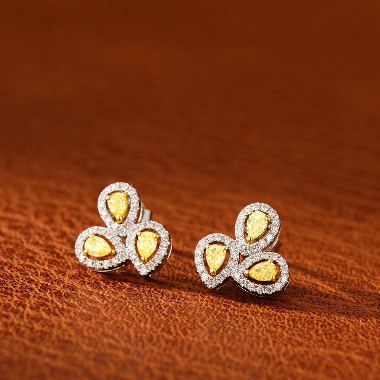 14k Gold 0.55 Ctw Natural Yellow Diamond & Diamond Earrings: Ref:231058330 // gold content:14k gold // main gemstone:yellow diamond // shape:pear // carat weight:0. 36ct // color:yellow // treatment:natural // // adjacent gemstone 2 : diamond // shape:round //