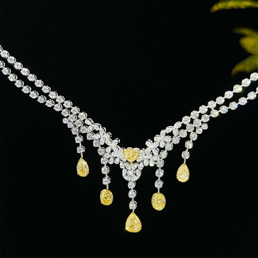 14k Gold 7.7 Ct Natural Color Diamond Necklace: Ref:231059008 // gold content:14k gold // main gemstone:diamond // shape:multiple // carat weight:7. 7ct // clarity grade:vs-si // color:color // treatment:natural // High Estimate: 61000 Low