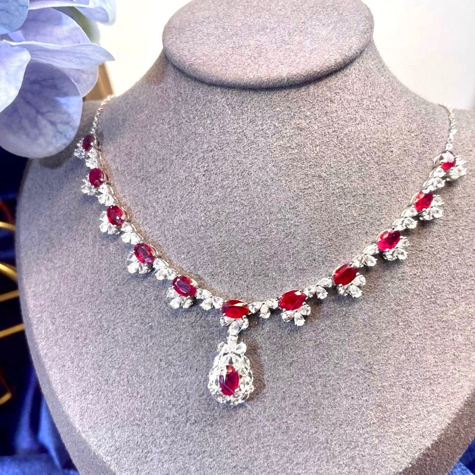 14k Gold 10.07 Ctw Natural Ruby & Sapphire Necklace: Ref:231059024 // gold content:14k gold // main gemstone:ruby // shape:oval // carat weight:5. 60ct // color:pigeonblood red // treatment:natural // // adjacent gemstone 2 : sapphire // shape:multiple 