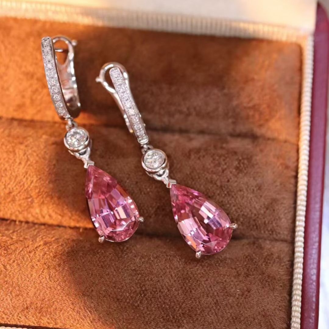 14k Gold 5.57 Ctw Natural Tourmaline & Diamond Earrings: Ref:231059095 // gold content:14k gold // main gemstone:tourmaline // shape:pear // carat weight:5. 27ct // color:pink // treatment:natural // // adjacent gemstone 2 : diamond // shape:round // carat