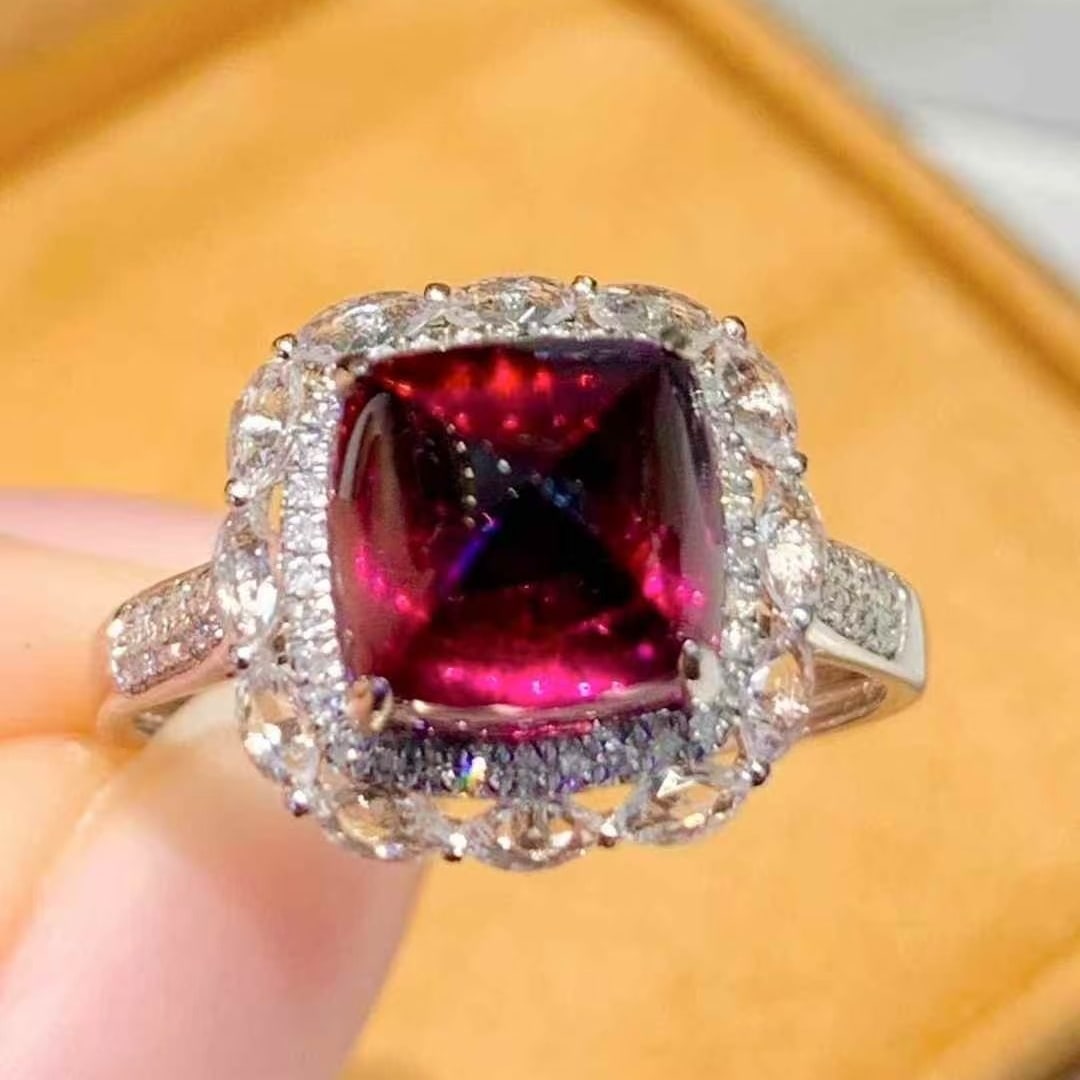 14k Gold 4.5 Ct Natural Tourmaline & Diamond Ring: Ref:231059138 // gold content:14k gold // ring size:7. 25us // // main gemstone:tourmaline // shape:sugar-loaf // carat weight:4. 5ct // color:red // treatment:natural // // adjacent gemstone 2 :