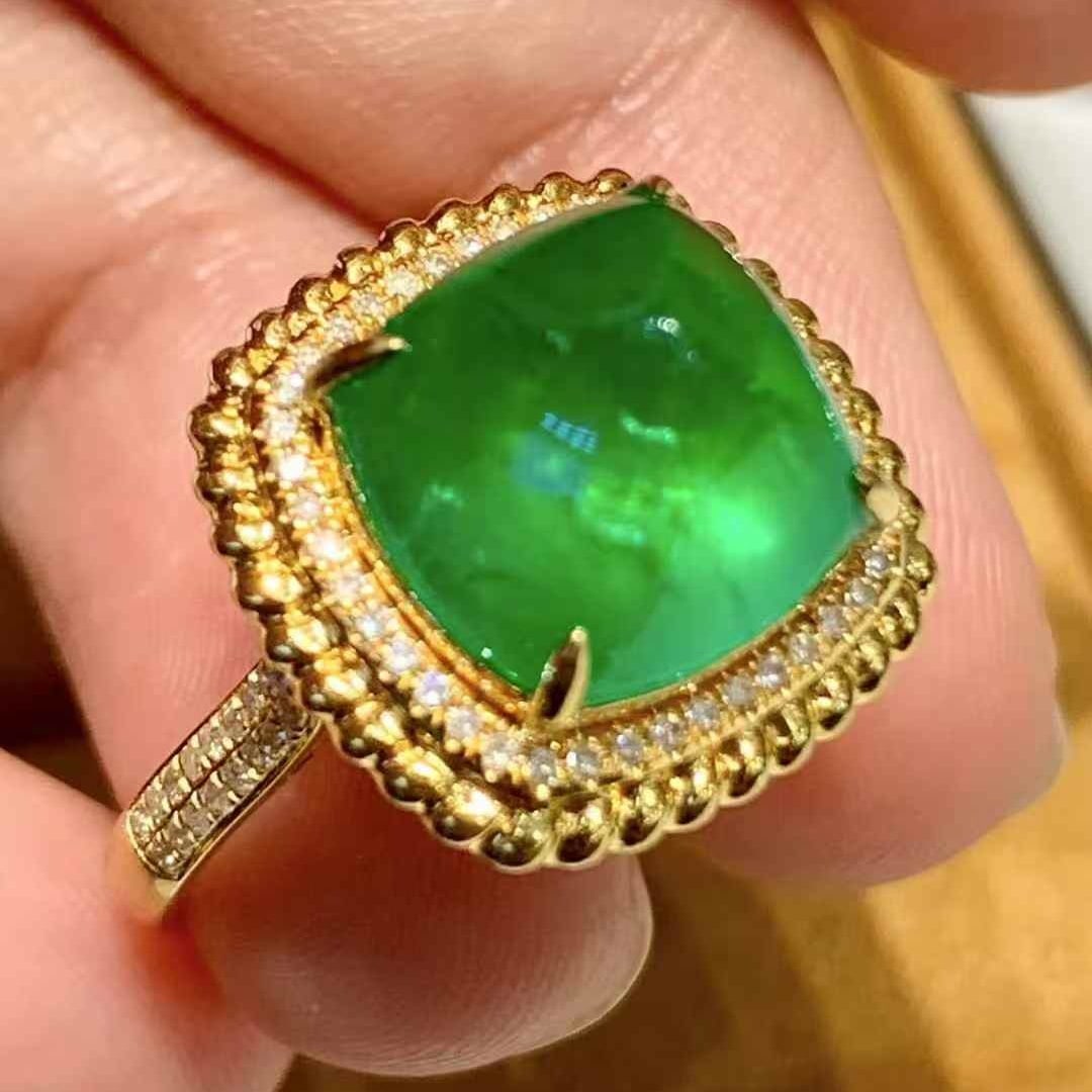 14k Gold 5.6 Ct Natural Emerald & Diamond Ring: Ref:231059155 // gold content:14k gold // ring size:7. 25us // // main gemstone:emerald // shape:sugar-loaf // carat weight:5. 6ct // color:green // treatment:natural // // adjacent gemstone 2 :