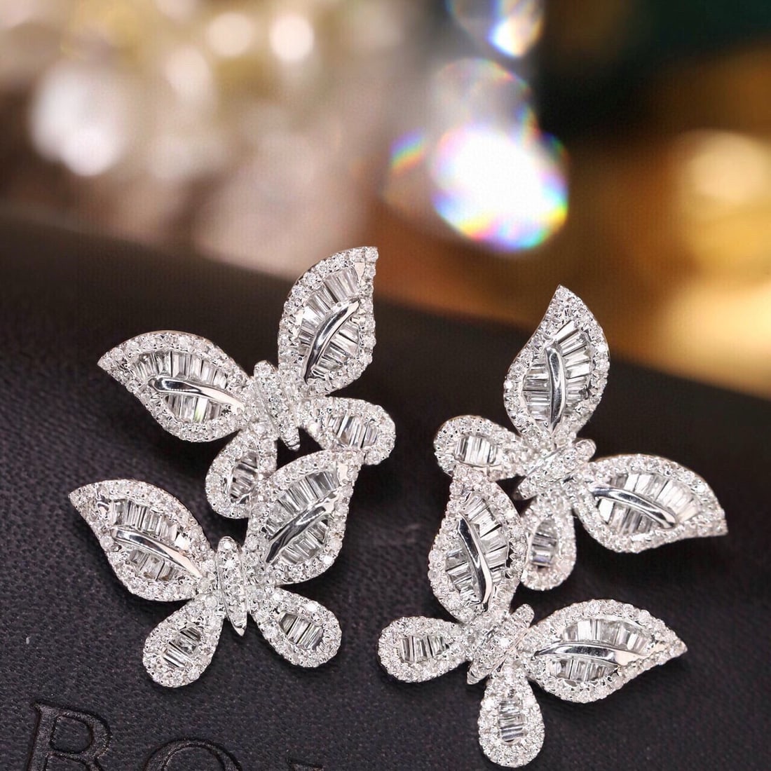 14k Gold 1.04 Ct Natural H Diamond & Butterfly Earrings: Ref:231059173 // gold content:14k gold // main gemstone:diamond // shape:multiple // carat weight:1. 04ct // clarity grade:vs-si // color:h // treatment:natural // High Estimate: 6600 Low Estimate: