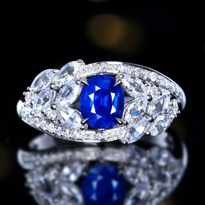 14k Gold 1.10 Ctw Natural Sapphire & Diamond Ring: Ref:231060007 // gold content:14k gold // ring size:7. 25us // // main gemstone:sapphire // shape:oval // carat weight:0. 90ct // color:royal blue // treatment:natural // // adjacent gemstone 2 :