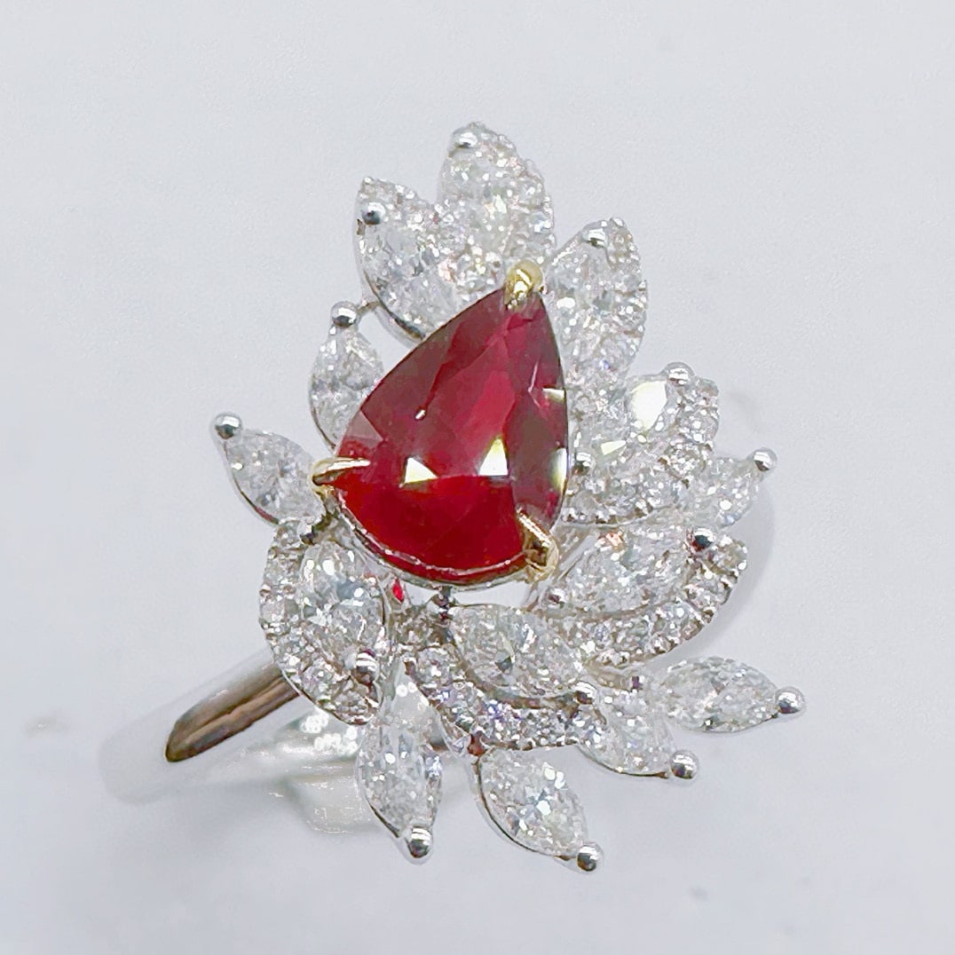 14k Gold 2.06 Ctw Natural Ruby & Diamond Ring: Ref:231060008 // gold content:14k gold // ring size:7. 25us // // main gemstone:ruby // shape:pear // carat weight:1. 23ct // color:pigeonblood red // treatment:natural // // adjacent gemstone 2 :