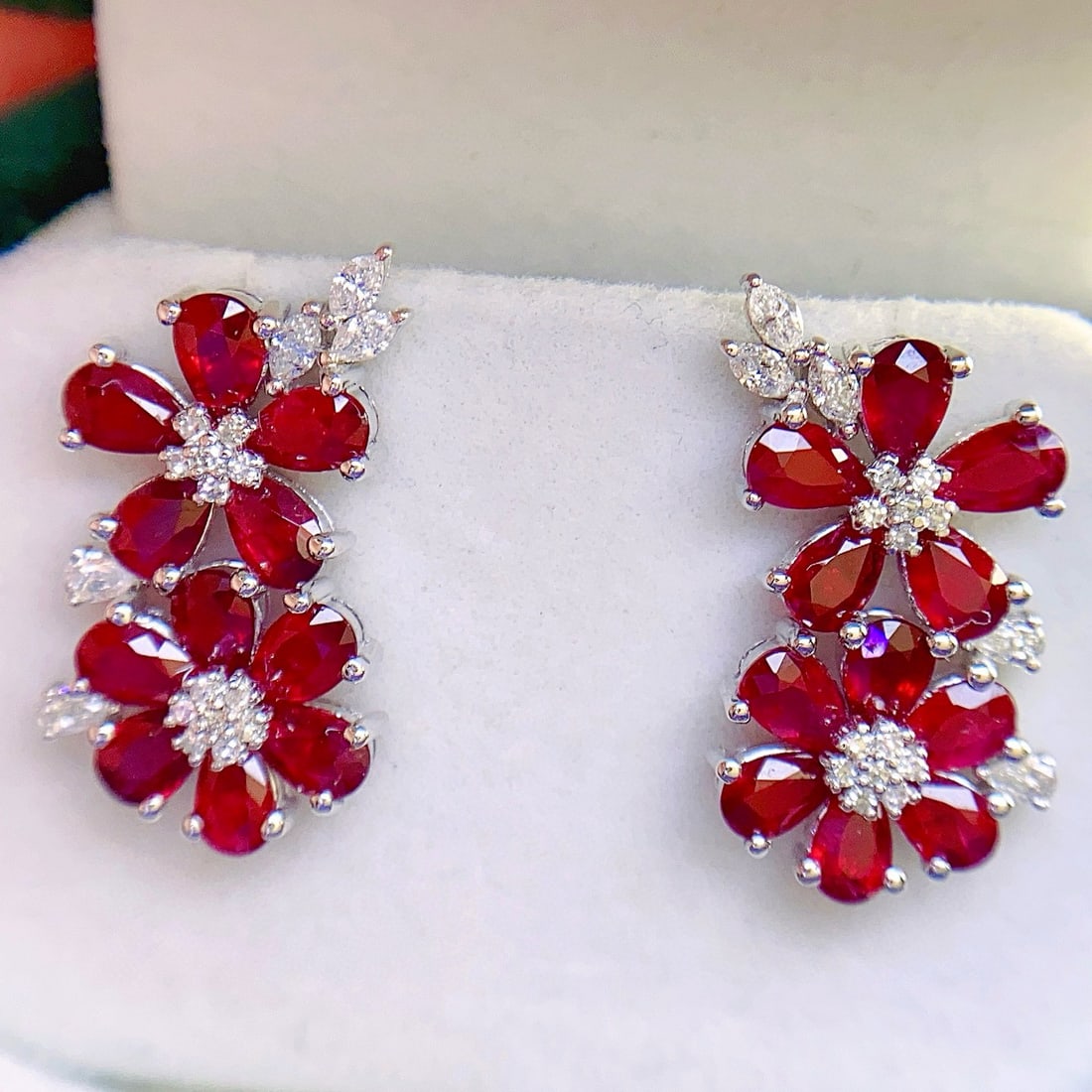 14k Gold 6.00 Ct Natural Ruby & Diamond Earrings: Ref:231060016 // gold content:14k gold // main gemstone:ruby // shape:pear // carat weight:6. 00ct // color:red // treatment:natural // // adjacent gemstone 2 : diamond // number of stones:38 // shape