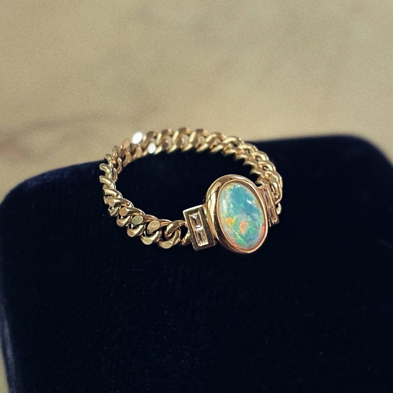 14k Gold 0.4 Ct Natural Opal & Diamond Ring: Ref:231060079 // gold content:14k gold // ring size:7. 25us // // main gemstone:opal // shape:oval // carat weight:0. 4ct // color:color // treatment:natural // // adjacent gemstone 2 : diamond //