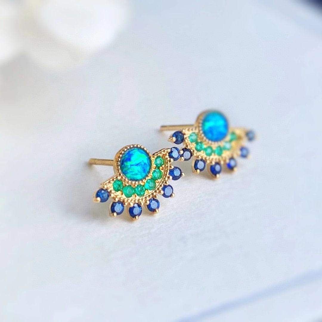 14k Gold 0.55 Ctw Natural Opal & Sapphire & Emerald Earrings: Ref:231060093 // gold content:14k gold // main gemstone:opal // shape:round // carat weight:0. 25ct // color:color // treatment:natural // cut grade:g // // adjacent gemstone 2 : sapphire & emerald