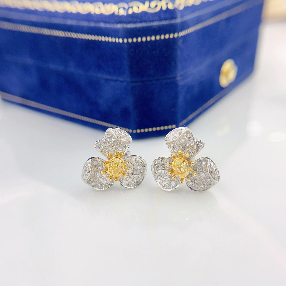 14k Gold 0.88 Ctw Natural Yellow Diamond & Diamond Earrings: Ref:231060094 // gold content:14k gold // main gemstone:yellow diamond // shape:oval // carat weight:0. 32ct // color:yellow // treatment:natural // // adjacent gemstone 2 : diamond // shape:round //