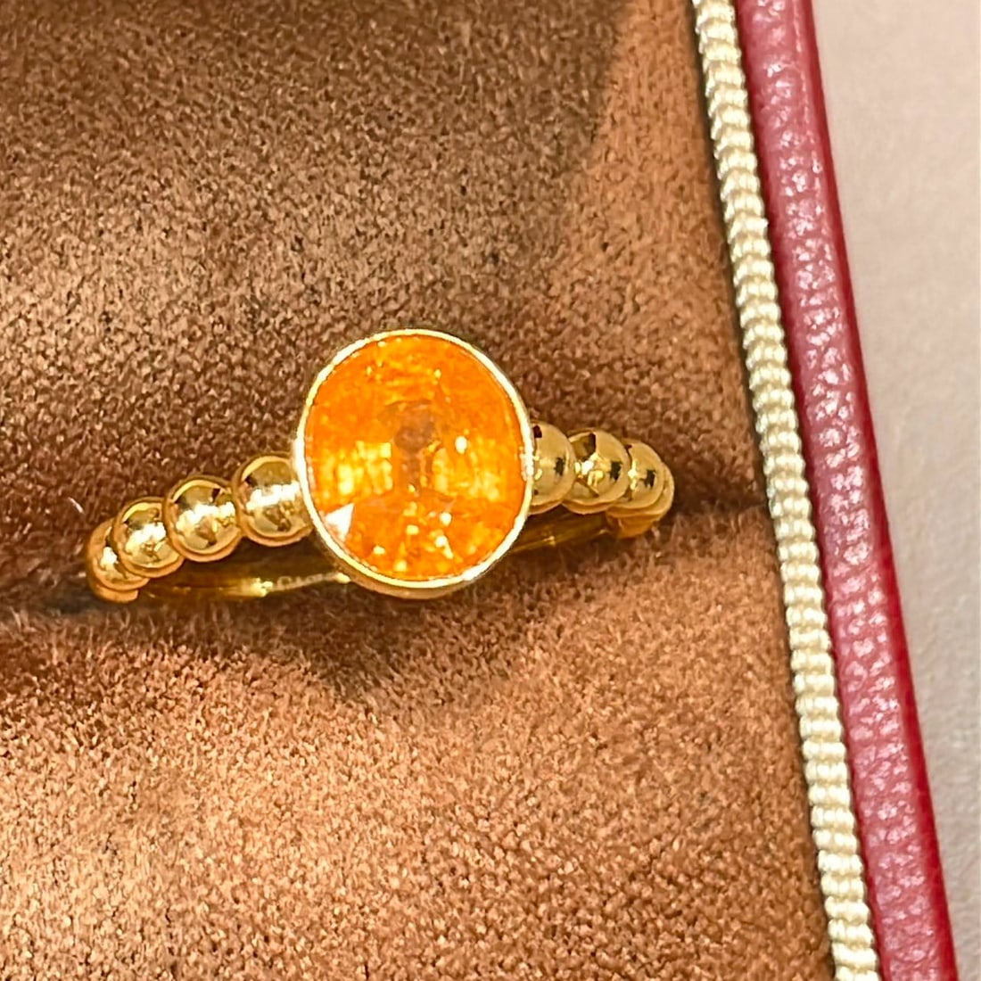 14k Gold 2.18 Ct Natural Spessartine Ring: Ref:231060110 // gold content:14k gold // ring size:7. 25us // // main gemstone:spessartine // shape:oval // carat weight:2. 18ct // color:orange // treatment:natural // Low Estimate: 2400 Condition: