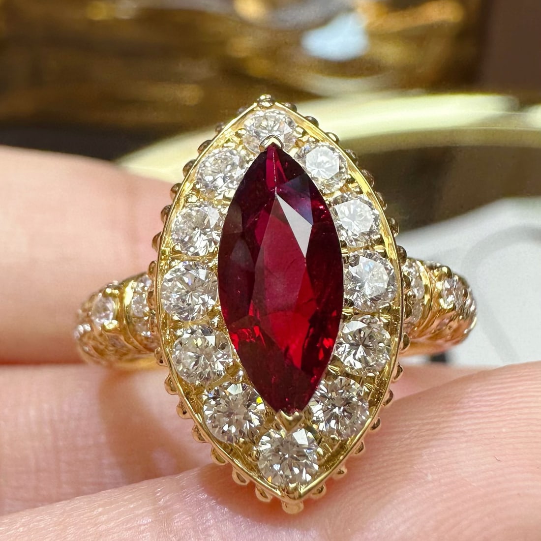 14k Gold 1.89 Ctw Natural Ruby & Diamond Ring: Ref:231060144 // gold content:14k gold // ring size:7. 25us // // main gemstone:ruby // shape:marquise // carat weight:1. 15ct // color:pigeonblood red // treatment:natural // // adjacent gemstone 2