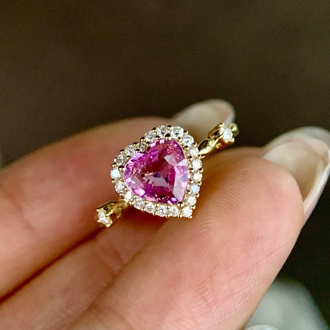 14k Gold 1.34 Ctw Natural Padparadscha Sapphire & Diamond Ring: Ref:231060174 // gold content:14k gold // ring size:7. 25us // // main gemstone:padparadscha sapphire // shape:heart // carat weight:1. 12ct // color:orangish pink // treatment:natural // // adjacent