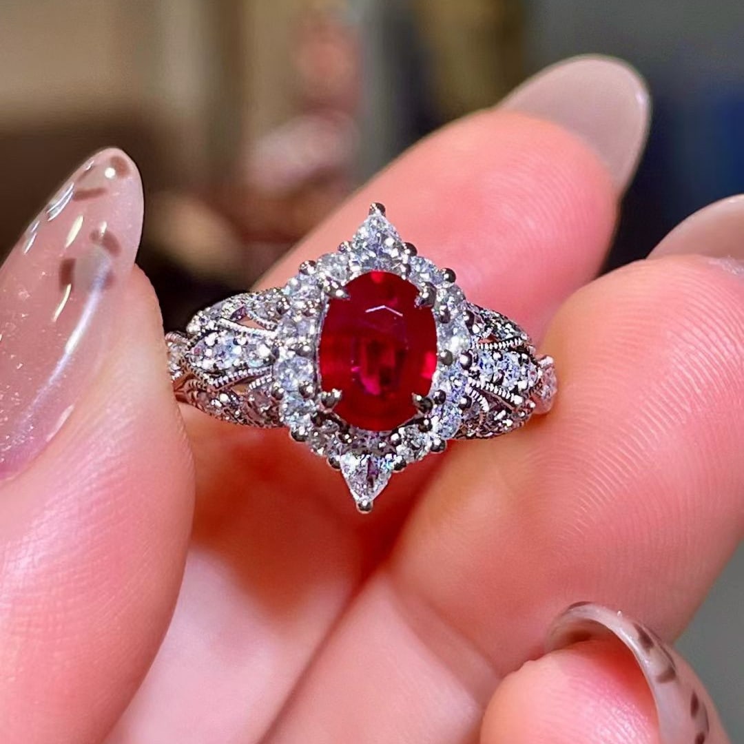 14k Gold 1.40 Ctw Natural Ruby & Diamond Ring: Ref:231060176 // gold content:14k gold // ring size:7. 25us // // main gemstone:ruby // shape:oval // carat weight:0. 81ct // color:pigeonblood red // treatment:natural // // adjacent gemstone 2 :