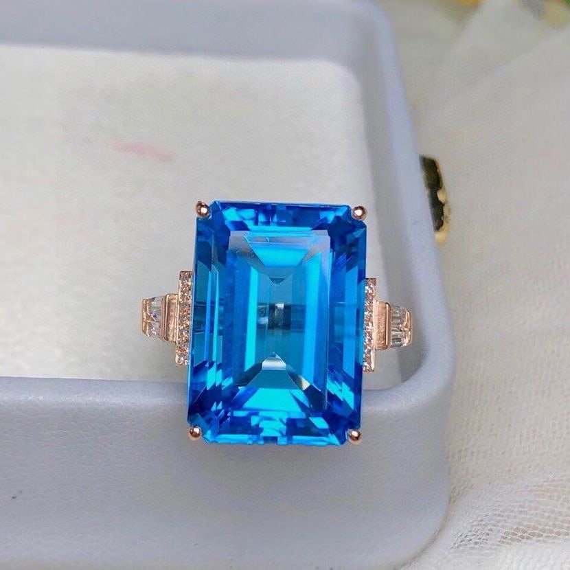 14k Gold 21.8 Ct Natural Topaz & Diamond & Sapphire Ring: Ref:231060205 // gold content:14k gold // ring size:7. 25us // // main gemstone:topaz // shape:octagonal // carat weight:21. 8ct // color:blue // treatment:natural // // adjacent gemstone 2 : diamond 
