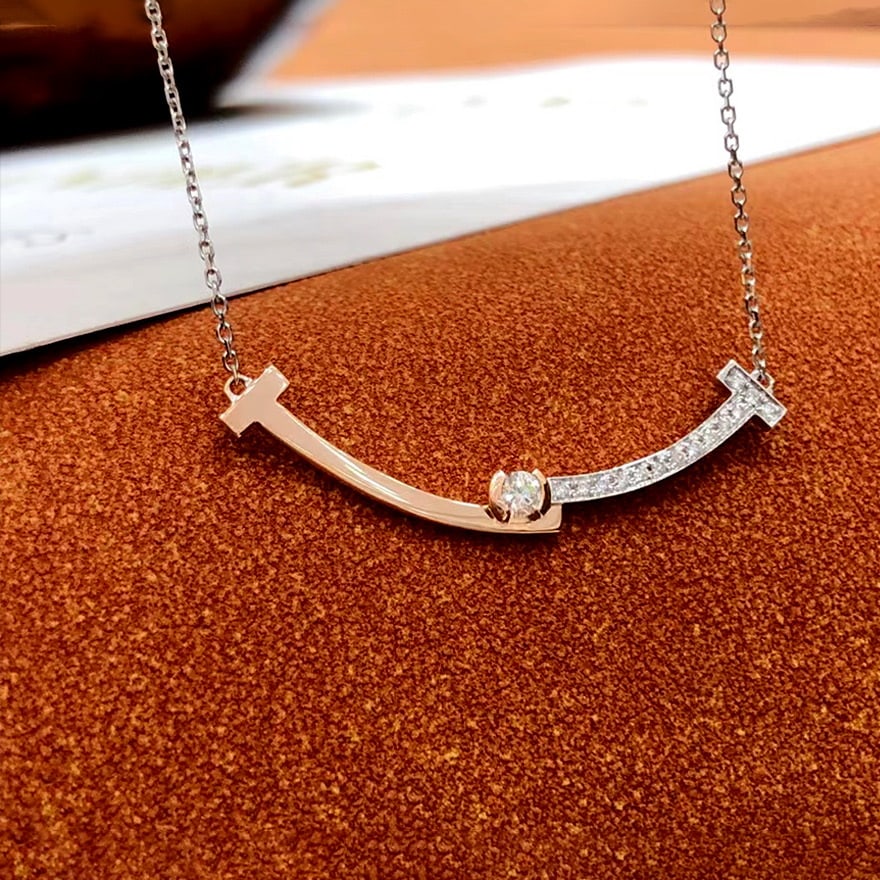 14k Gold 0.13 Ctw Natural H Diamond Necklace: Ref:231060212 // gold content:14k gold // main gemstone:diamond // shape:round // carat weight:0. 06ct // clarity grade:vs-si // color:h // treatment:natural // cut grade:g // // adjacent gemstone 2