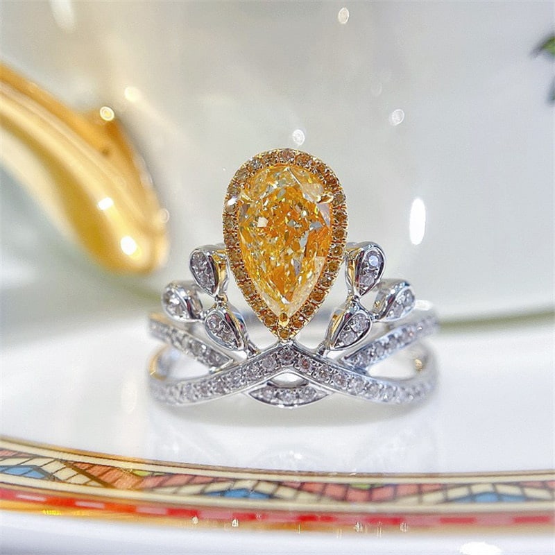 14k Gold 1.00 Ct Natural Yellow Diamond & Diamond Ring: Ref:231060303 // gold content:14k gold // ring size:7. 25us // // main gemstone:yellow diamond // shape:pear // carat weight:1. 00ct // color:yellow // treatment:natural // // adjacent gemstone 2 :