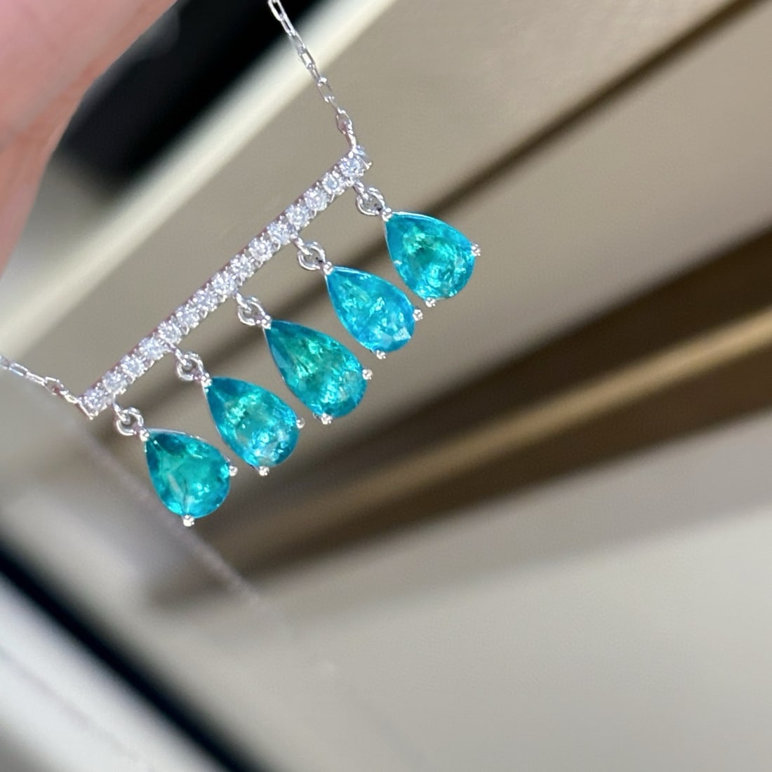 14k Gold 1.77 Ct Natural Paraiba Tourmaline & Diamond Necklace: Ref:231060391 // gold content:14k gold // main gemstone:paraiba tourmaline // shape:pear // carat weight:1. 77ct // color:blue // treatment:natural // // adjacent gemstone 2 : diamond // shape:round