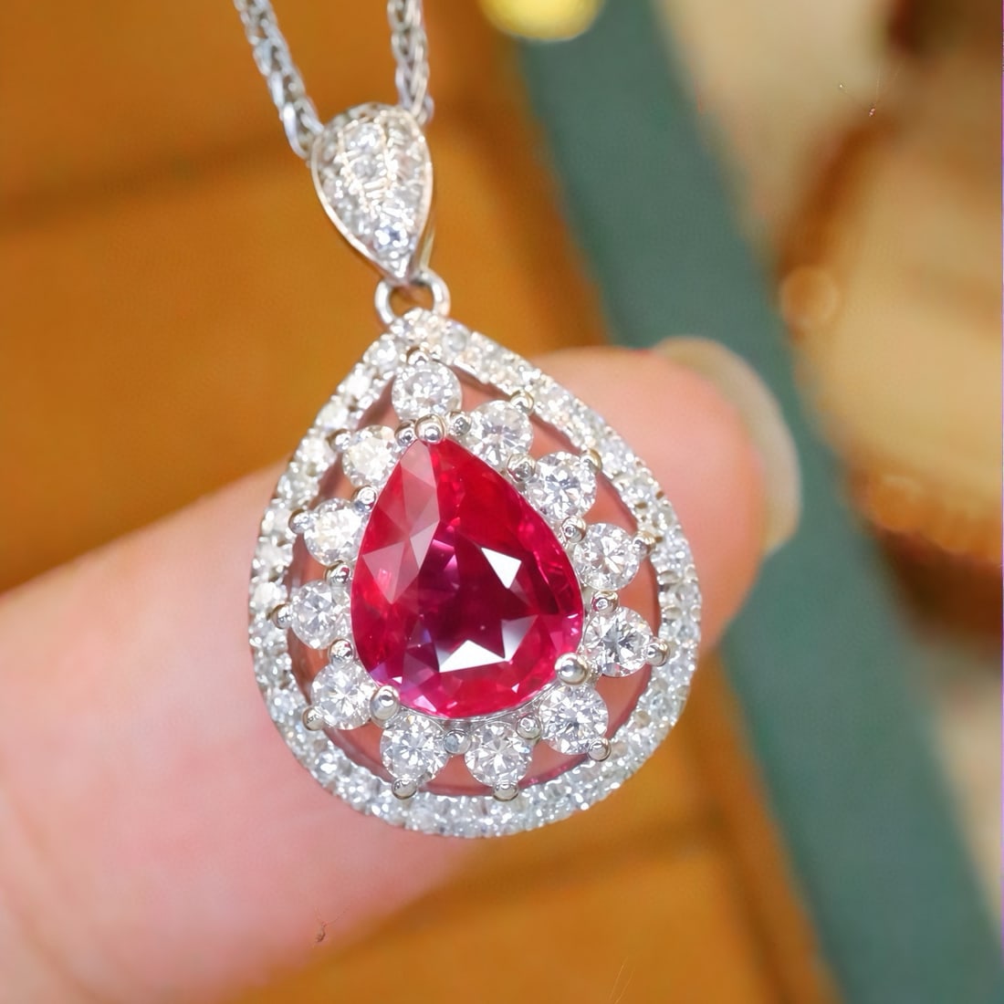 14k Gold 1.40 Ctw Natural Ruby & Diamond Pendant( Without Chain ): Ref:231060412 // gold content:14k gold // main gemstone:ruby // shape:pear // carat weight:1. 02ct // color:red // treatment:natural // // adjacent gemstone 2 : diamond // number of stones:59 // shape